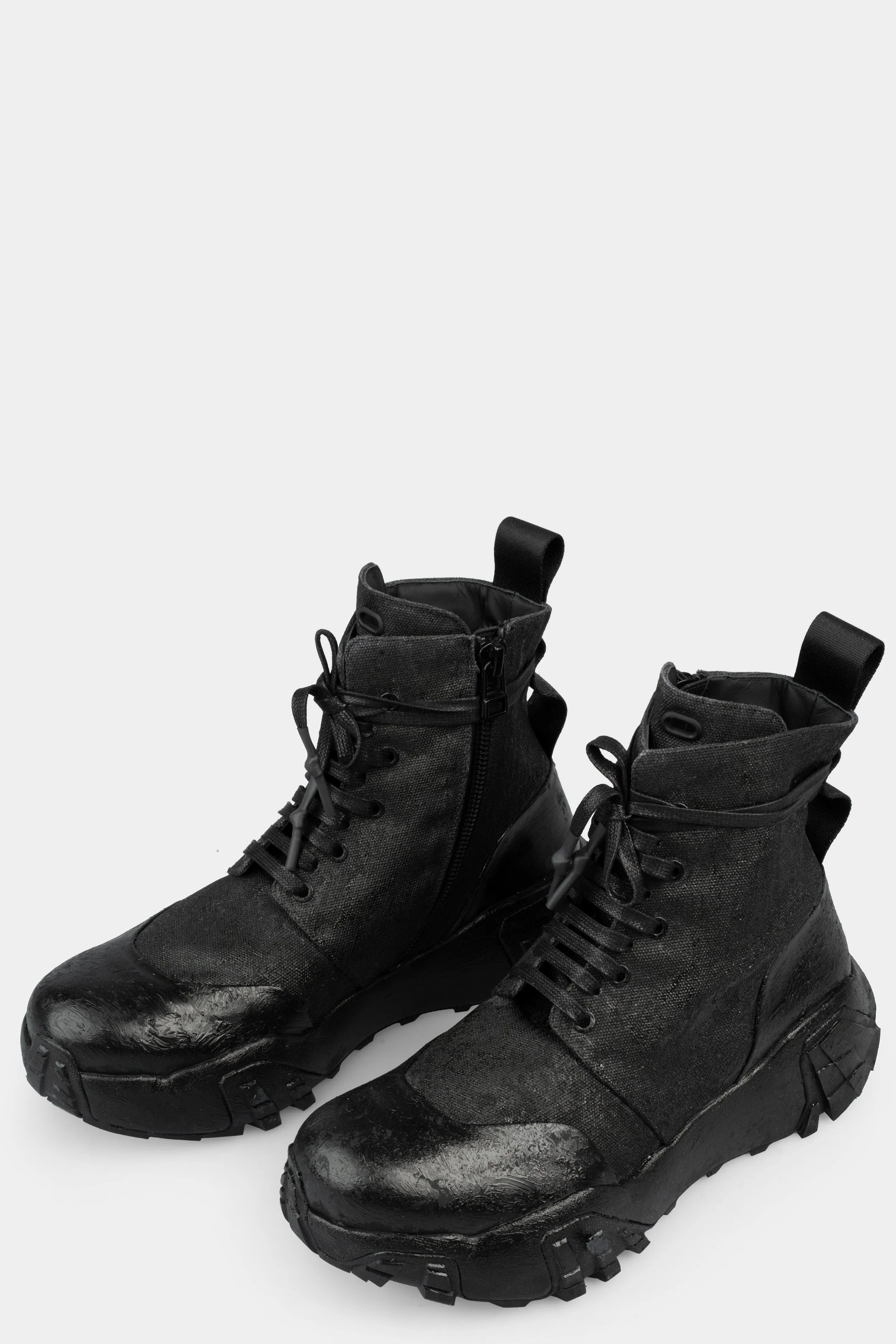 Tar coated canvas boots