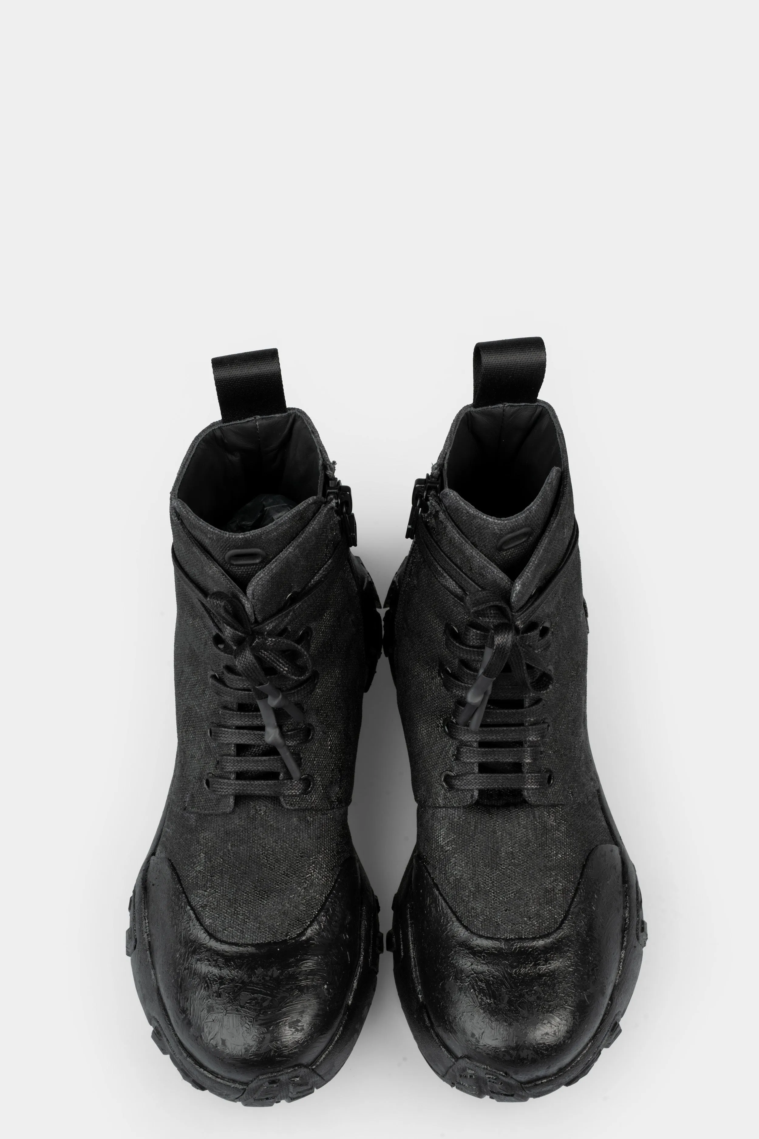 Tar coated canvas boots