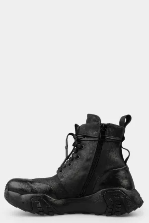 Tar coated canvas boots