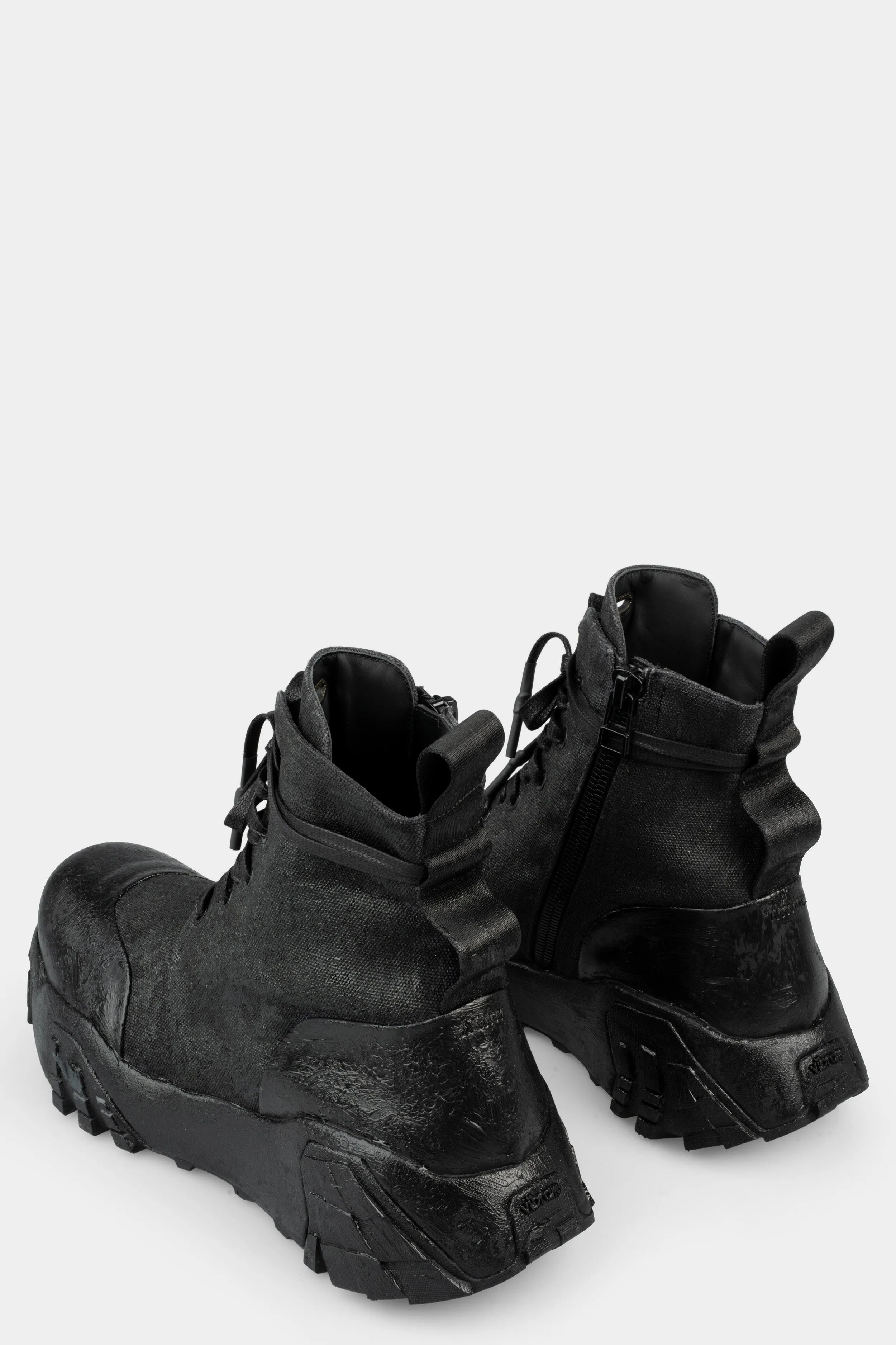 Tar coated canvas boots